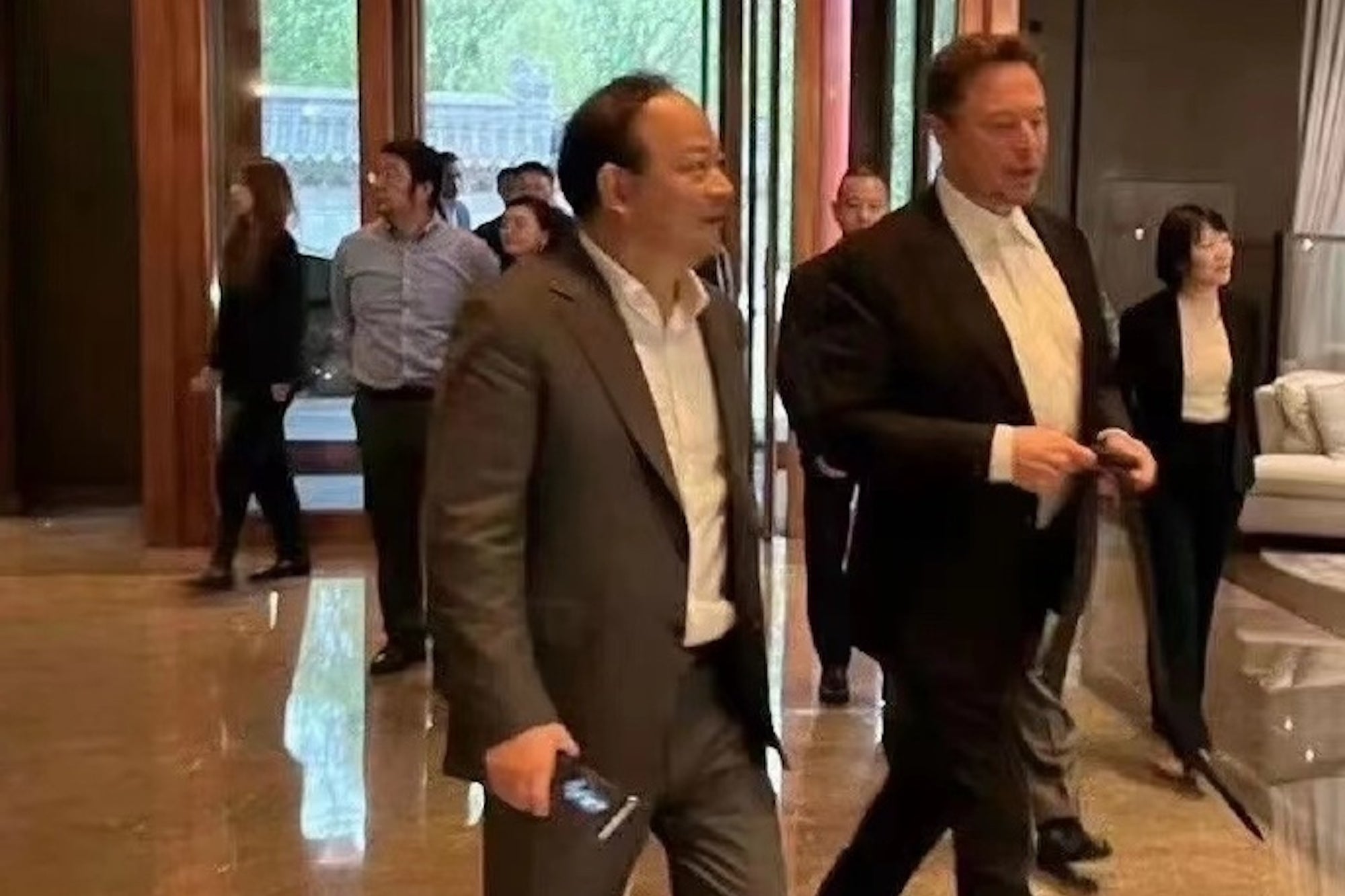 American CEOs Visit China, Elon Musk Hailed as 'Global Idol'